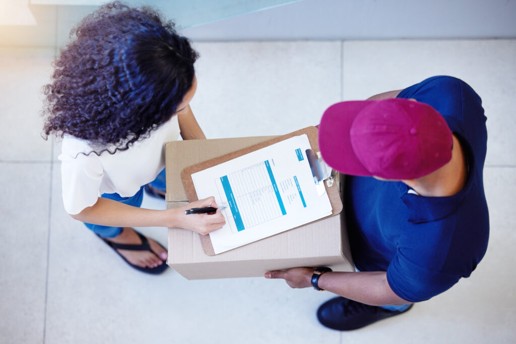 package signature customer shipping delivery guy with woman cardboard clipboard office entrepreneur box company man document with agreement legal client